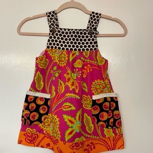 La Jenn’s size 4T dress in pink, brown, green, orange and a touch of blue.